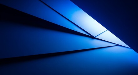 Abstract geometric blue background with angular shapes creating a dynamic interplay of light and shadow, evoking modern design, technology, and futuristic concepts, clean.