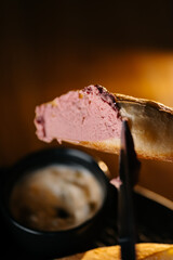 Pate spread on slice of bread in soft golden light