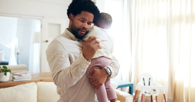 Black dad, child and fever with thermometer in home for flu symptoms, illness or disease. Father, kid or sick toddler with concern, worry or checking temperature for allergy, virus or healthcare