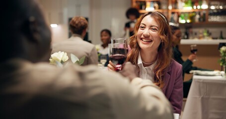 Couple, date and toast in restaurant with wine for romance, anniversary celebration and love. Hospitality, conversation and happiness with man, woman and cheers with dinner together and bonding