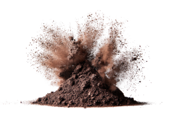 Brown powder explosion in mid-air, against a black background, creating a dynamic abstract effect