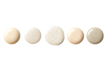 Five circular cream-colored blobs, arranged in a row, exhibiting different textures