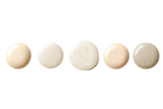 Five circular cream-colored blobs, arranged in a row, exhibiting different textures - Powered by Adobe