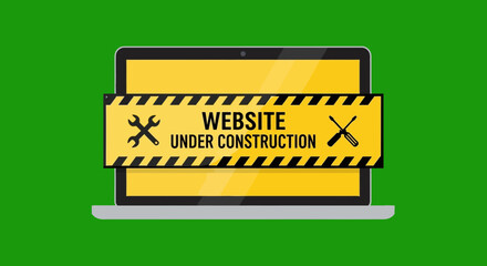 Website under construction notice on laptop screen for maintenance work