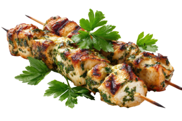 Grilled chicken skewers with herb marinade and parsley garnish on a black background
