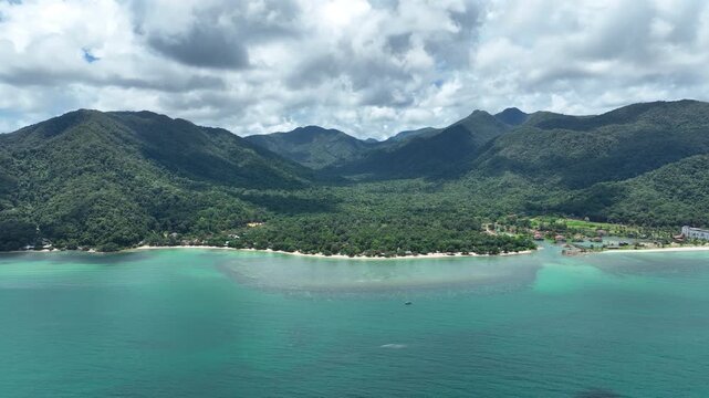 Klong Kloi Beach With Forested Mountain Range In The Background In Ko Chang, Trat, Thailand. Aerial Wide Shot