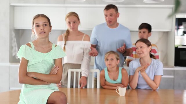 Offended teenage girl turned away from her family. Family quarrel. High quality 4k footage