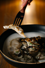 Homemade cheesecakes with peach slices and cream