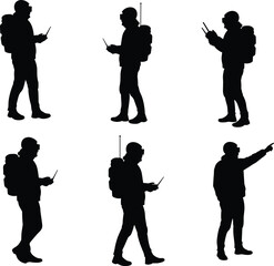 Silhouette person, backpack, walkie-talkie, GPS device, outdoor navigation, exploration, trekking, communication, hiking gear, emergency response, technology, modern lifestyle, fieldwork