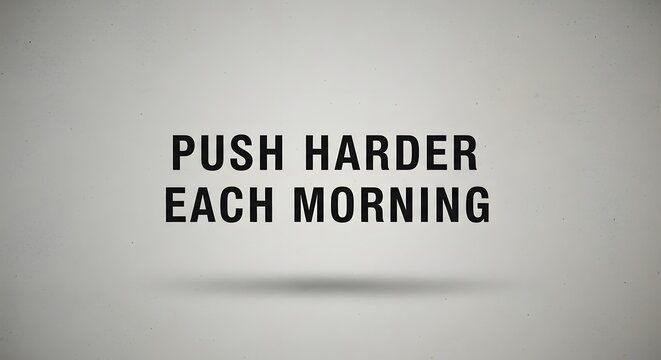 Motivational quote on a wall encouraging persistence and effort every morning to start the day with determination and positivity