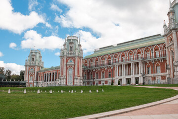 Fototapeta premium Exploring Tsaritsyno Park With Its Beautiful Architecture and Vibrant Greenery Under a Blue Sky