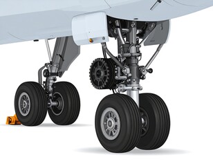 Detailed view of an aircraft landing gear with wheels
