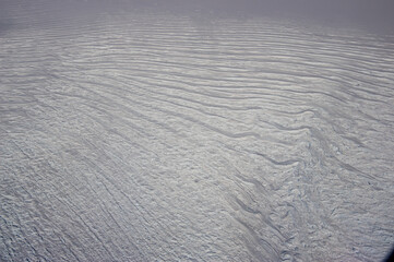 Aerial view of wind blown ice dunes and texture - Antarctica