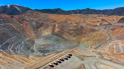 View of benches and mining roads of a huge open-pit mine