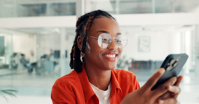 Typing, businesswoman and happy with phone in office for viral online video, post shares or chat. Social media specialist, black person or smile with smartphone for performance report or client email