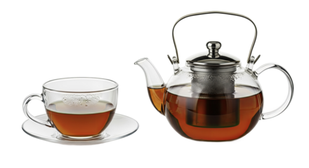 Clear glass teapot and cup filled with amber tea