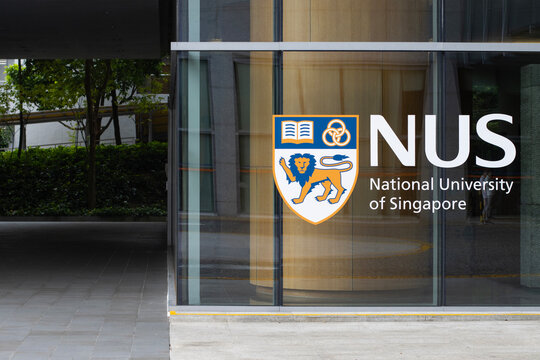 Singapore - July 25, 2025: NUS sign is seen at the University Hall, Lee Kong Chian Wing, on the campus of the National University of Singapore (NUS), a public research university in Singapore.