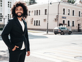 Handsome smiling hipster  model.Sexy unshaven Arabian man dressed in summer suit jacket clothes....