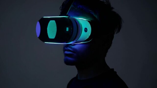 Immersive virtual reality experience in a darkened room with futuristic headset technology