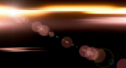 Optical lens flare effect with warm golden light and sun rays on black background. Abstract cinematic overlay for photo editing, film design or background texture