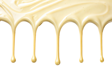 Sweetened Condensed Milk Drips on White Surface
