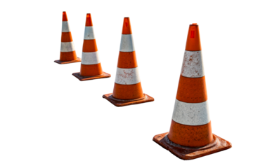 Orange Traffic Cones Lined Up on Snowy Surface