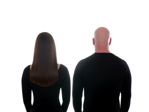 Back view of woman with long straight brown hair and bald man, both wearing black shirts, standing side by side against transparent background, neutral mood