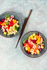 Appetizing salad with seafood.