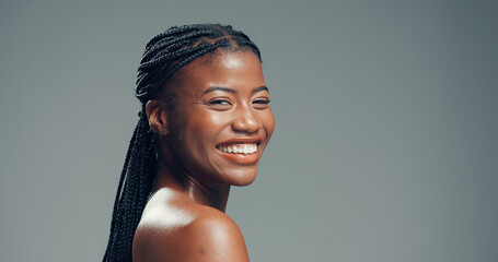 Portrait, smile and black woman in studio, skincare and dermatology on gray background. Mockup...