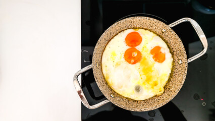 Fried Eggs with Melted Cheese