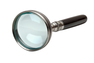 Vintage magnifier glass detailed view antique lens reading tool old silver frame black background