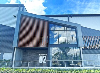 The front of a warehouse unit in a larger warehouse complex