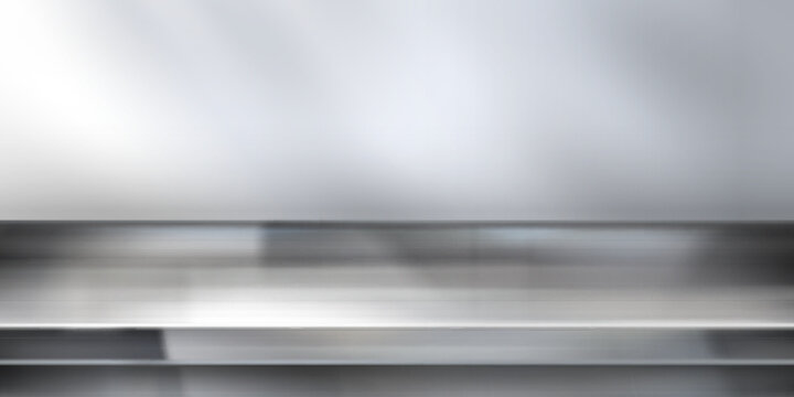 Stainless steel kitchen counter with wall background - metallic silver table top surface in modern cooking space. Industrial metal workspace with smooth polished texture and reflective finish.