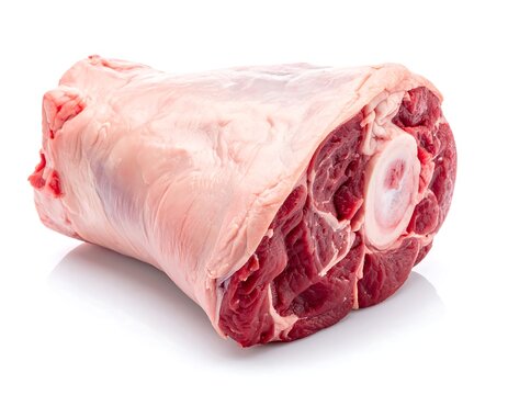 Large raw meat cut, showing fat and bone, isolated on white background