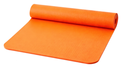 Bright orange yoga mat partially rolled out on smooth surface with soft natural lighting and minimalistic background for fitness and health lifestyle
