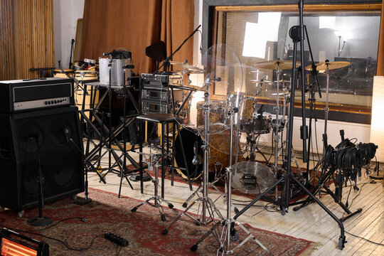 Recording studio setup with musical instruments and equipment