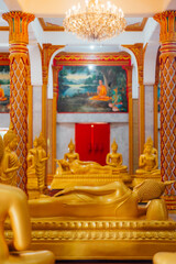 Golden reclining Gautama Buddha statues Wat Chalong temple, Phuket