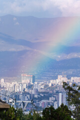 Rainbow over Tbilisi city downtown