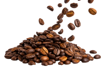 Pile of roasted coffee beans with falling beans