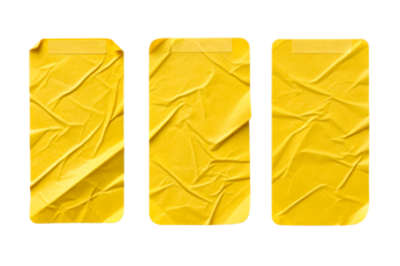 Three Crumpled Yellow Paper Labels with Tape