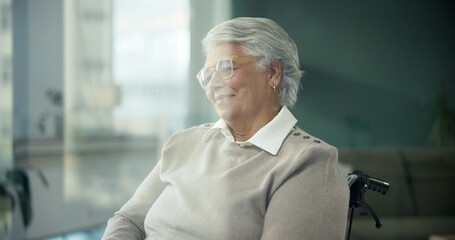 Senior woman, wheelchair and thinking at window, smile and reflection for recovery in retirement....