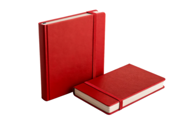 Two red notebooks with elastic bands on white