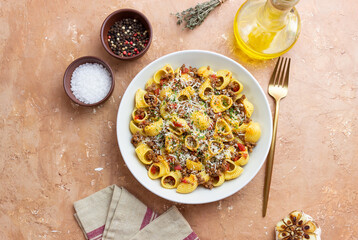Pasta with bolognese sauce and cheese. Italian cuisine. Traditional recipe.