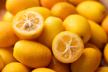Fresh kumquats fruit texture background