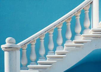 White stone staircase ascending against a vibrant blue wall