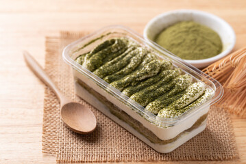 Matcha Tiramisu cake with green tea powder on top, Italian dessert fusion with Japanese