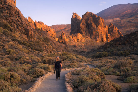Woman Trekking Through Canadas Del Teide National Park at Sunrise in Tenerife, Spain