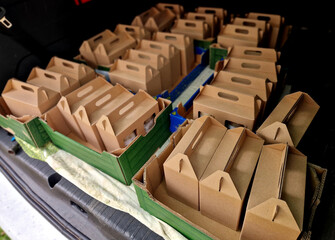 folding boxes for transporting gift packages such as alcohol, food or local products. products from our paper mill for your business talent. car trunk full of bribes © Michal