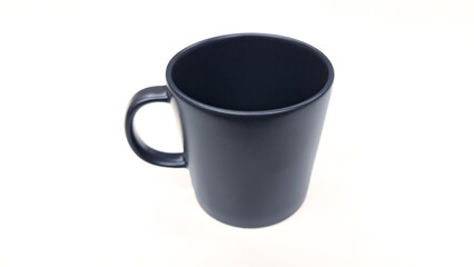 Empty ceramic gray mug on white background. dark grey tea cup isolated on white.
