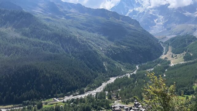 Macugnaga, Pecetto hamlet, Italy. Important valley in the Italian Alps at the foot of Monte Rosa and its glacier, summer panorama and view from above. Tilt and pan